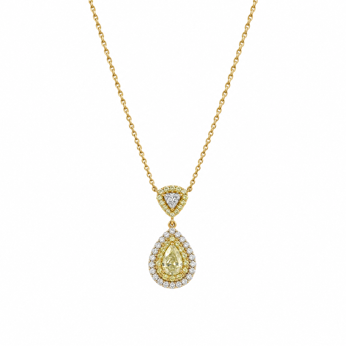 Studio shot of a luxurious 18K gold necklace featuring a ~0.31ct pear-shaped natural yellow diamond pendant with a double halo of colorless and yellow diamonds.