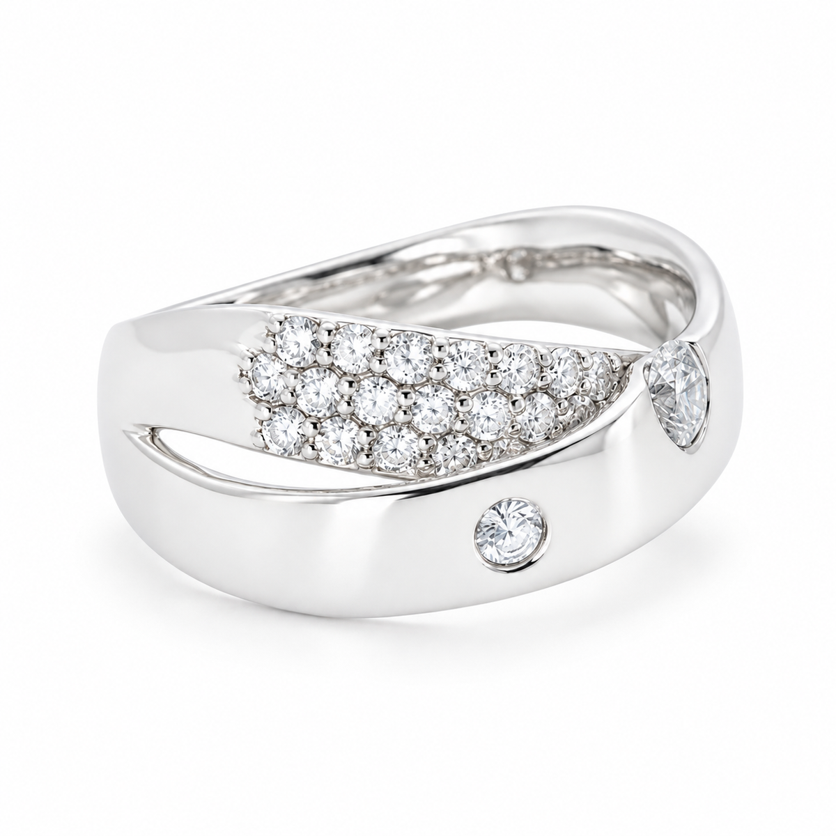 Angled view of a platinum natural diamond crossover ring with polished curves, pavé diamonds and openwork detailing.