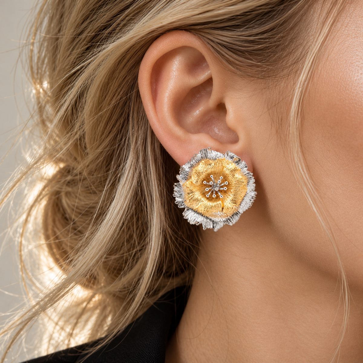 925 sterling silver Golden Core Poppy stud earrings featuring sculptural textured silver petals and a vibrant 18K gold-plated center inspired by a blooming Mediterranean poppy.