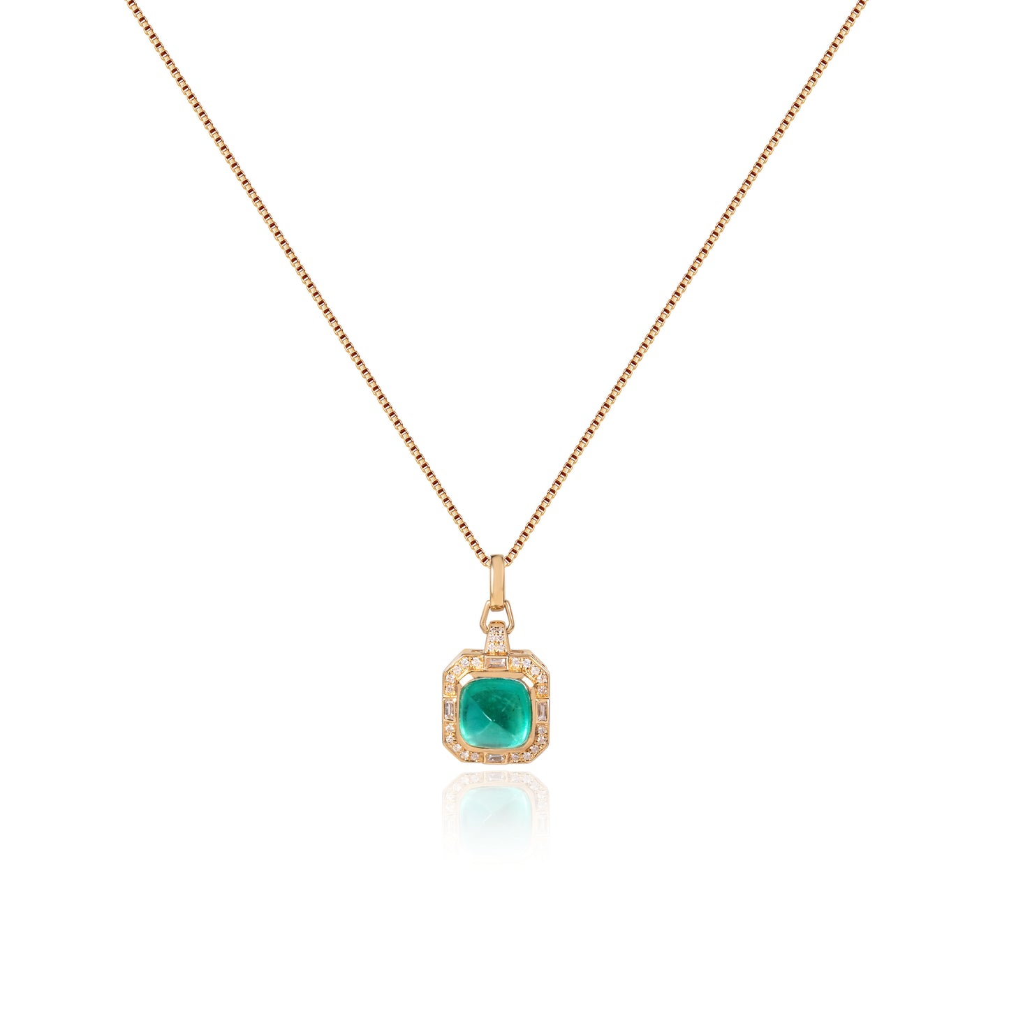 Natural sugarloaf emerald pendant in fine gold by Fantasilvia Fine Jewelry.