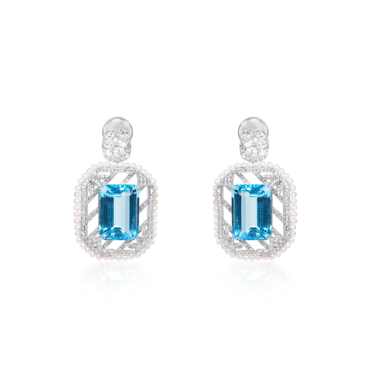 Natural blue topaz and diamond drop earrings in fine gold by Fantasilvia Fine Jewelry.