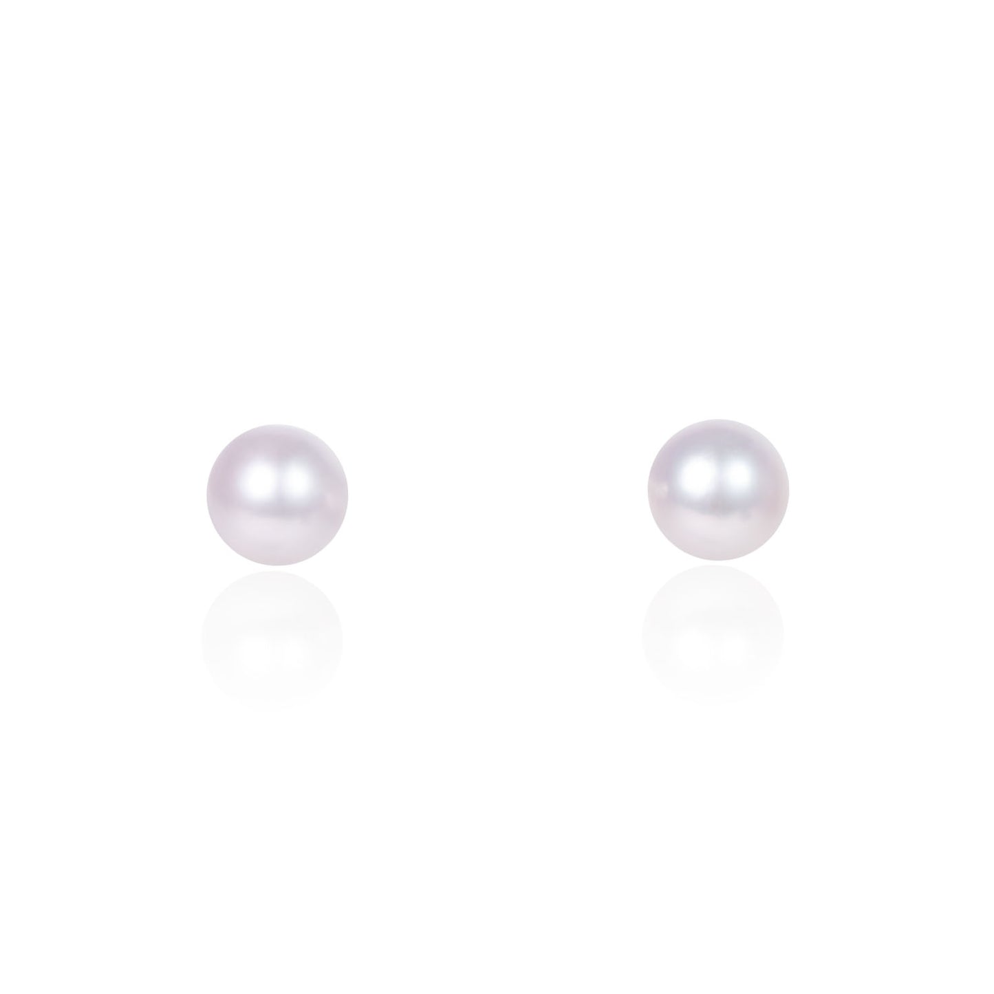 Akoya pearl stud earrings in fine gold by Fantasilvia Fine Jewelry.