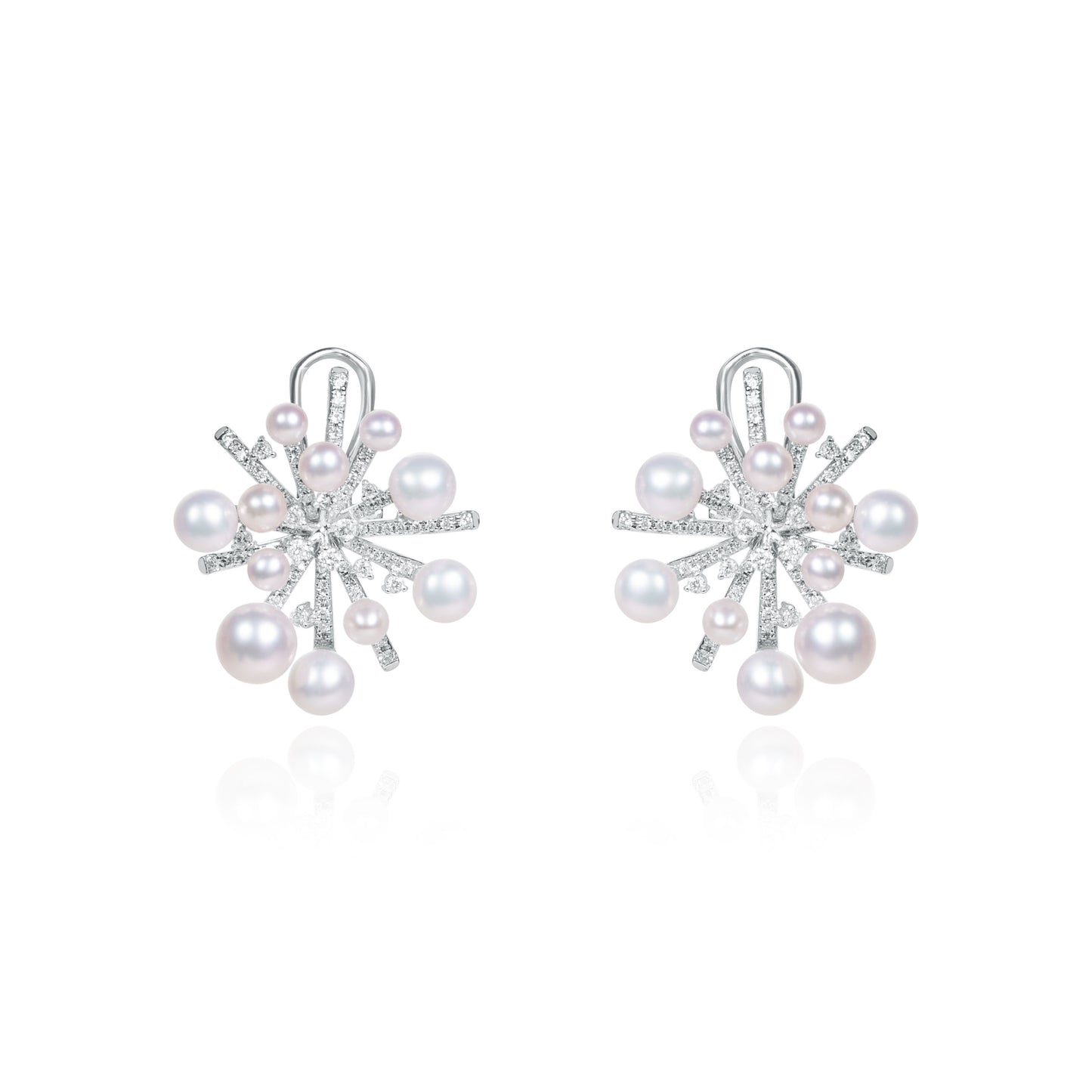 Snowflake-inspired freshwater pearl and diamond brooch crafted by Fantasilvia Fine Jewelry