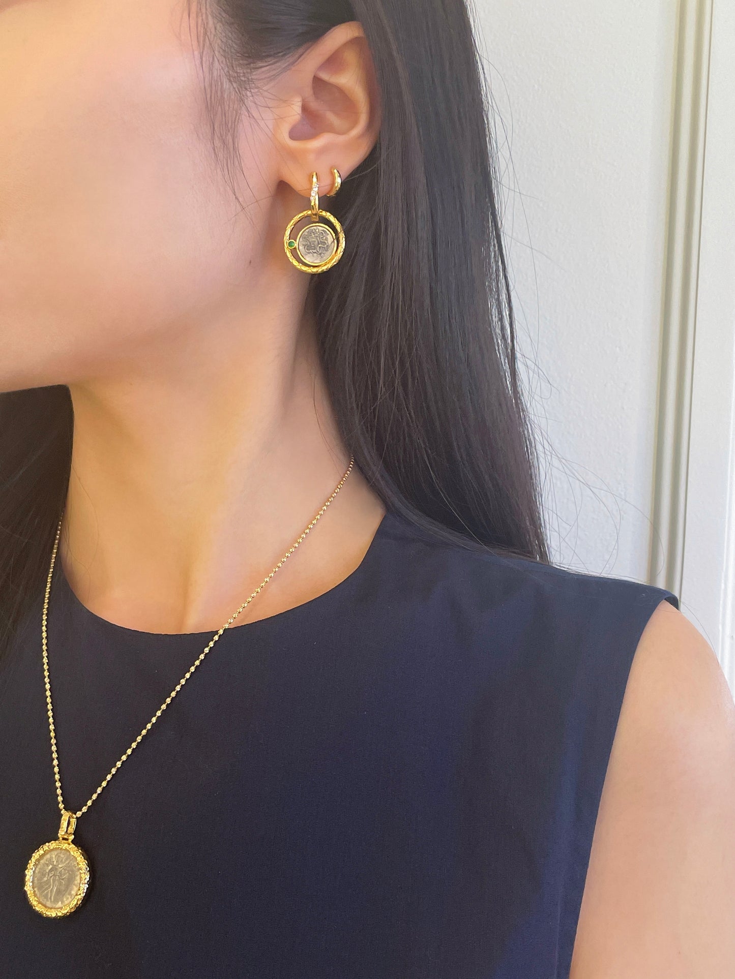 Pendentif en pièce de monnaie antique de l'Empire parthe