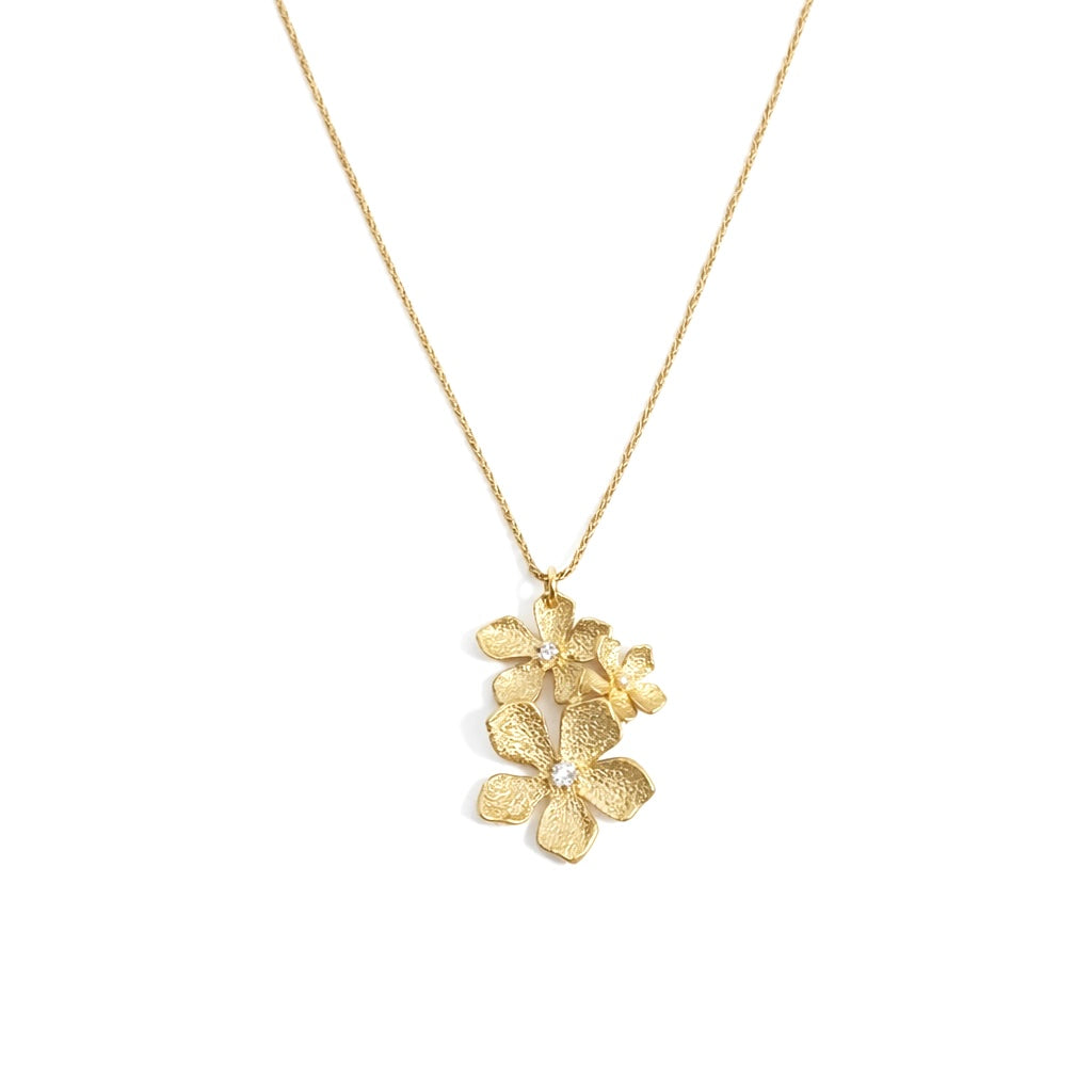 Textured gold vermeil pendant featuring a cluster of three five-petal flowers - The Golden Trio Bloom necklace