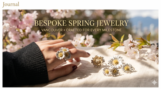 Close-up of Fantasilvia bespoke daisy cluster jewelry collection on linen with a soft Vancouver spring garden and mountains background, featuring text 'Bespoke Spring Jewelry - Vancouver'.