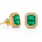 Angled studio shot of a 14K gold stud earring featuring a rectangular emerald surrounded by a lab diamond halo on a white background.