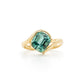 3.225 carat cushion-cut Afghan Lagoon Tourmaline ring in a modern 14K yellow gold bypass setting.
