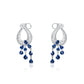 Pair of 18K white gold chandelier earrings featuring diamond pavé loops and cascading pear-shaped natural blue sapphire drops.