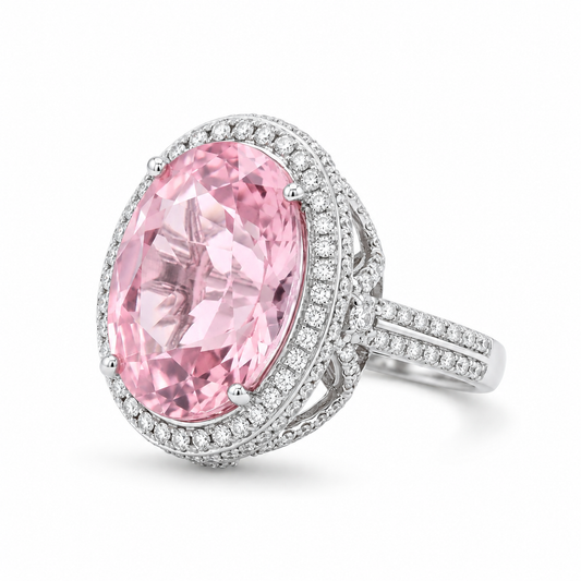 18K white gold statement ring featuring a 13.4-carat oval-cut natural pink tourmaline surrounded by a double halo of natural diamonds and a pavé diamond split-shank band.