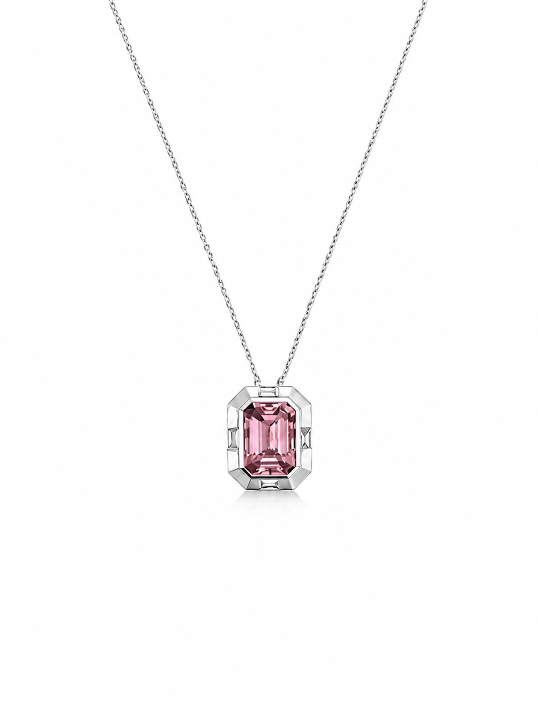 Studio shot of a 2.30 carat emerald-cut natural Afghan pink tourmaline pendant necklace, featuring a modern geometric 18K white gold setting suspended on a delicate sparkle chain.
