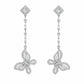 A pair of 18K white gold diamond drop earrings against a white background. Each earring features a diamond-shaped stud, a linear drop chain of alternating round and baguette diamonds, and a detailed butterfly pendant at the base set with a mix of round and baguette-cut diamonds.