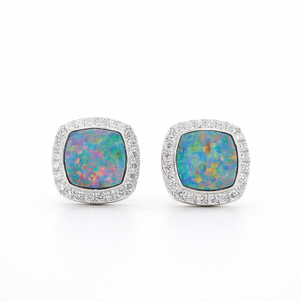 PT950 platinum stud earrings featuring a 1.433ct and 1.665ct natural opal with 0.265ct lab-diamond halos on each side.