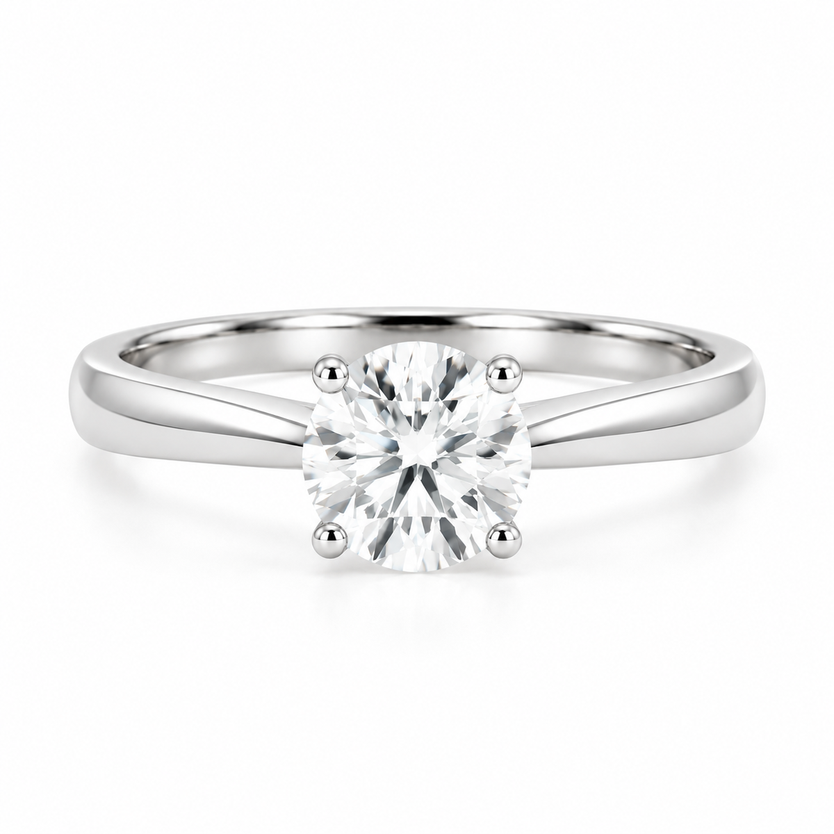 Front view of a 1.13 ct round lab-grown diamond solitaire ring in 14K solid white gold, with four prongs and a polished tapered band.