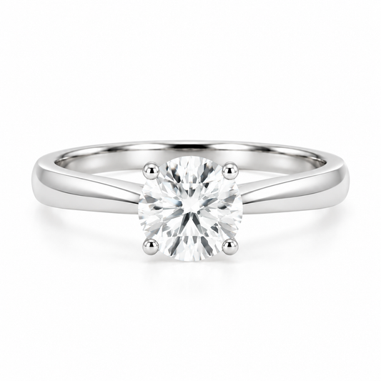 Front view of a 1.13 ct round lab-grown diamond solitaire ring in 14K solid white gold, with four prongs and a polished tapered band.