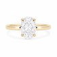 Top-down view of a 2.01 carat oval lab-grown diamond engagement ring set on a polished 18K yellow gold band.