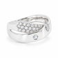 Angled view of a platinum natural diamond crossover ring with polished curves, pavé diamonds and openwork detailing.