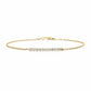 A delicate Fantasilvia 18K yellow gold chain bracelet featuring a horizontal bar of ten small round pavé diamonds on a white background.