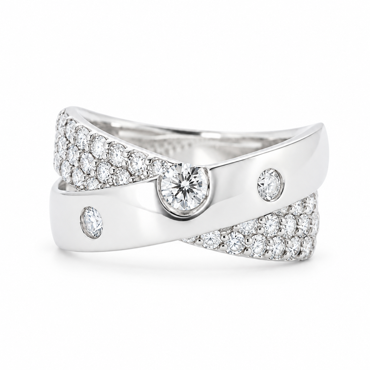 Front view of a platinum natural diamond crossover ring with three round diamond accents and a pavé diamond band.