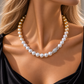 Gradient South Sea pearl necklace featuring top-grade white and golden pearls with exceptional luster, near-round shapes, and a seamless natural ombré transition from white to rich golden tones.