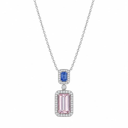 18K white gold pendant necklace featuring an emerald-cut natural blue sapphire and a 3.00 carat natural pink morganite, both surrounded by colorless diamond halos.