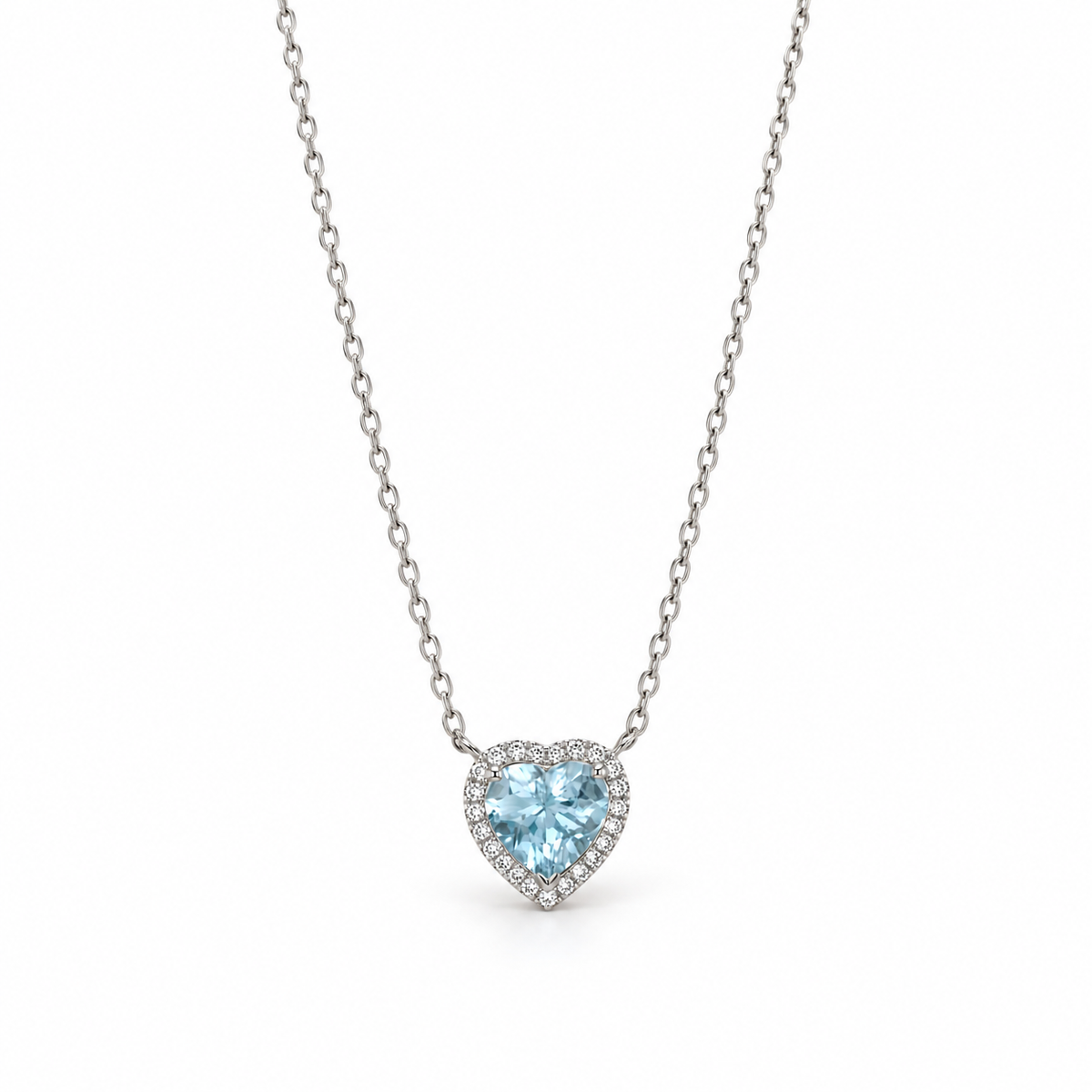 18K white gold heart-shaped aquamarine and diamond halo pendant necklace, by Fantasilvia Fine Jewelry.