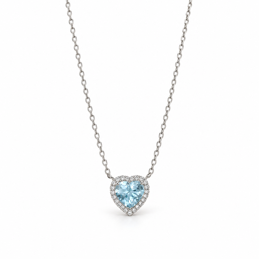 18K white gold heart-shaped aquamarine and diamond halo pendant necklace, by Fantasilvia Fine Jewelry.