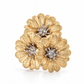 Top-down view of the Trio Bloom daisy statement ring in 18K gold vermeil, featuring three textured flowers with sparkling centers on a white background.