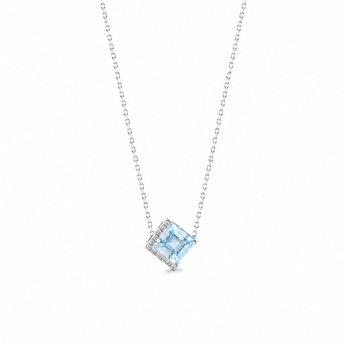 A 0.60ct square-cut Santa Maria aquamarine pendant in a kite setting, accented with diamonds and crafted in 18K white gold, hanging elegantly on a delicate sparkle chain.