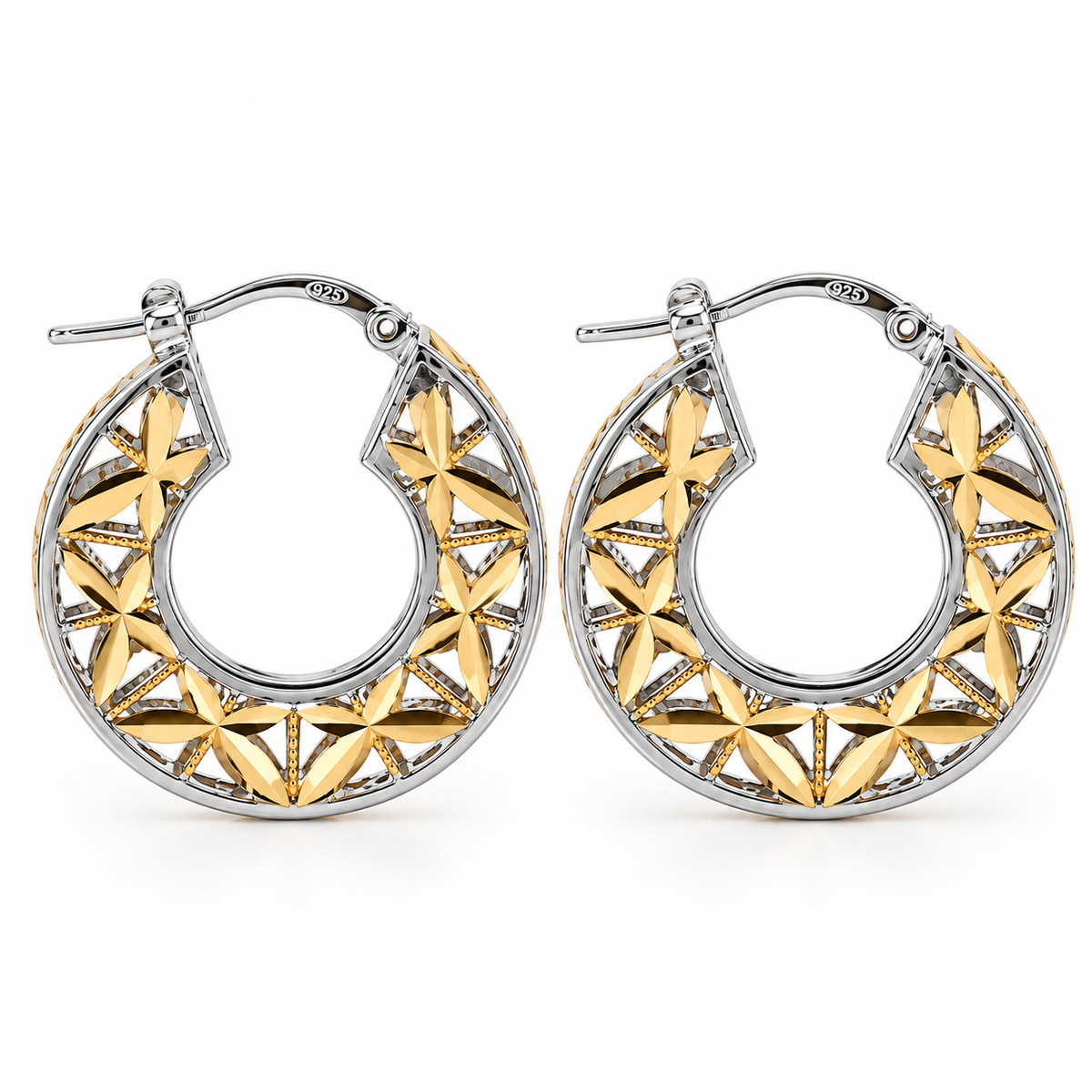 Front view of the Stella Fiorita two-tone hoop earrings featuring a polished 925 sterling silver outer frame and an intricate openwork gold vermeil floral star pattern.