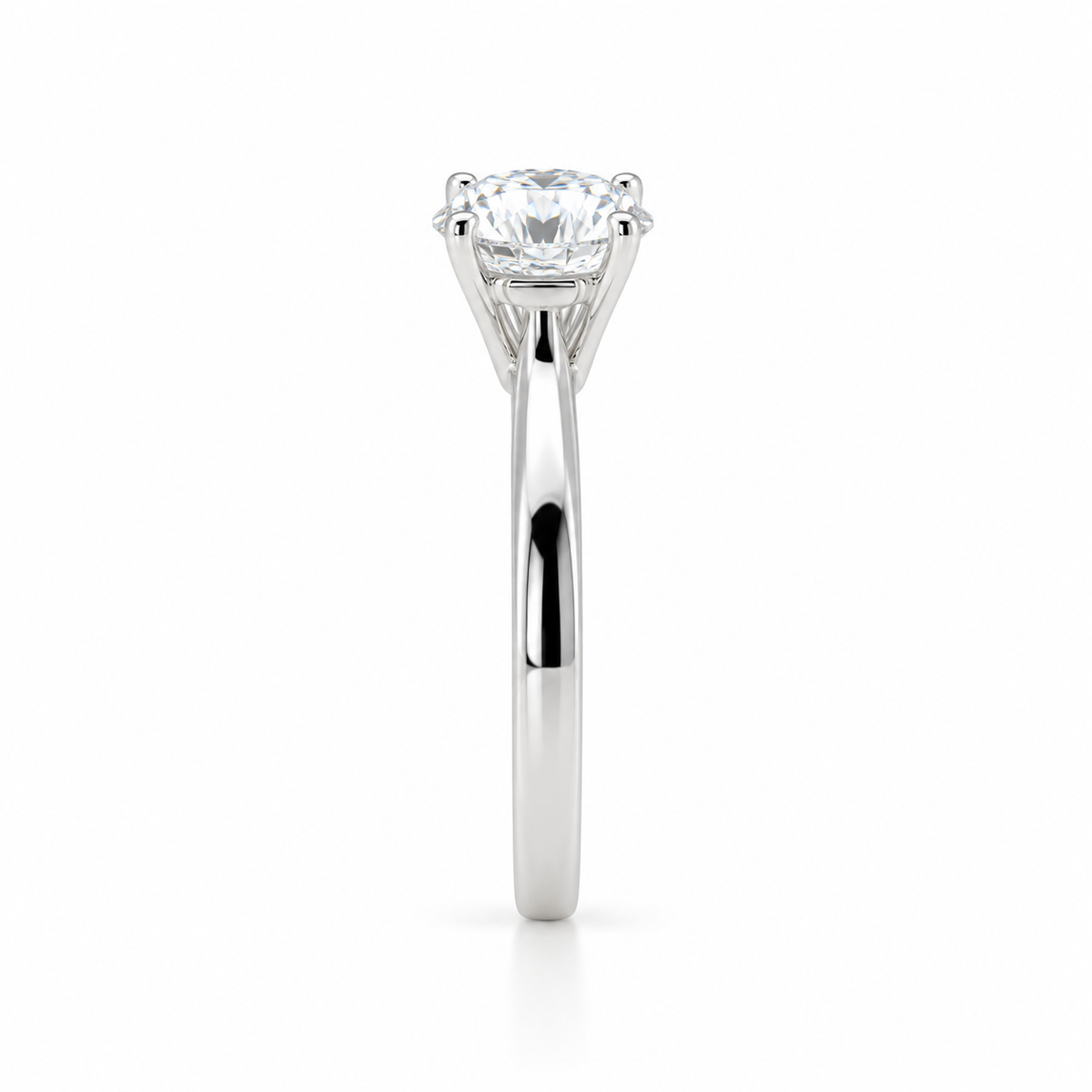 End-on view of a 1.13 ct lab-grown diamond solitaire ring showing the open four-prong setting and polished 14K white gold band.