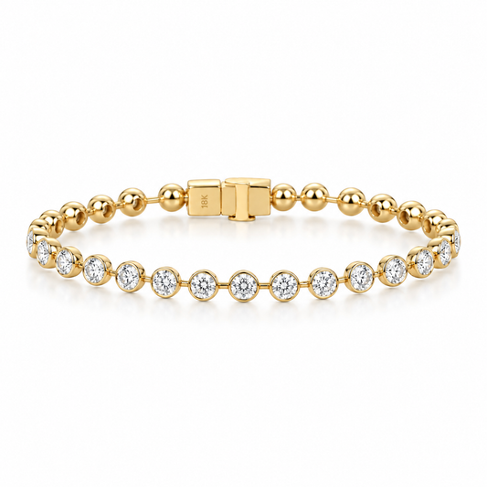 18K gold lab-grown diamond tennis bracelet featuring round brilliant-cut diamonds in sleek bezel settings with a secure box clasp.