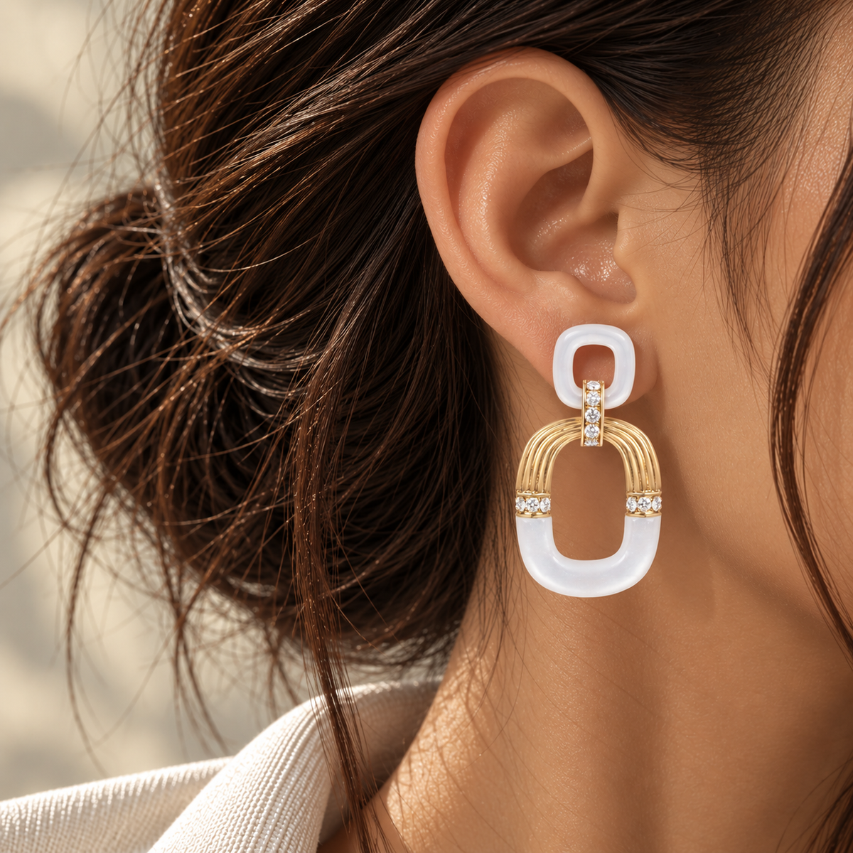 18K yellow gold statement drop earrings featuring luminous mother-of-pearl links accented with sparkling natural colorless diamonds in a bold geometric design.