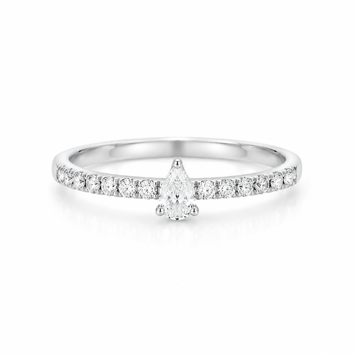 18K white gold natural diamond ring featuring a pear-shaped center diamond with round brilliant-cut diamonds set along the band.