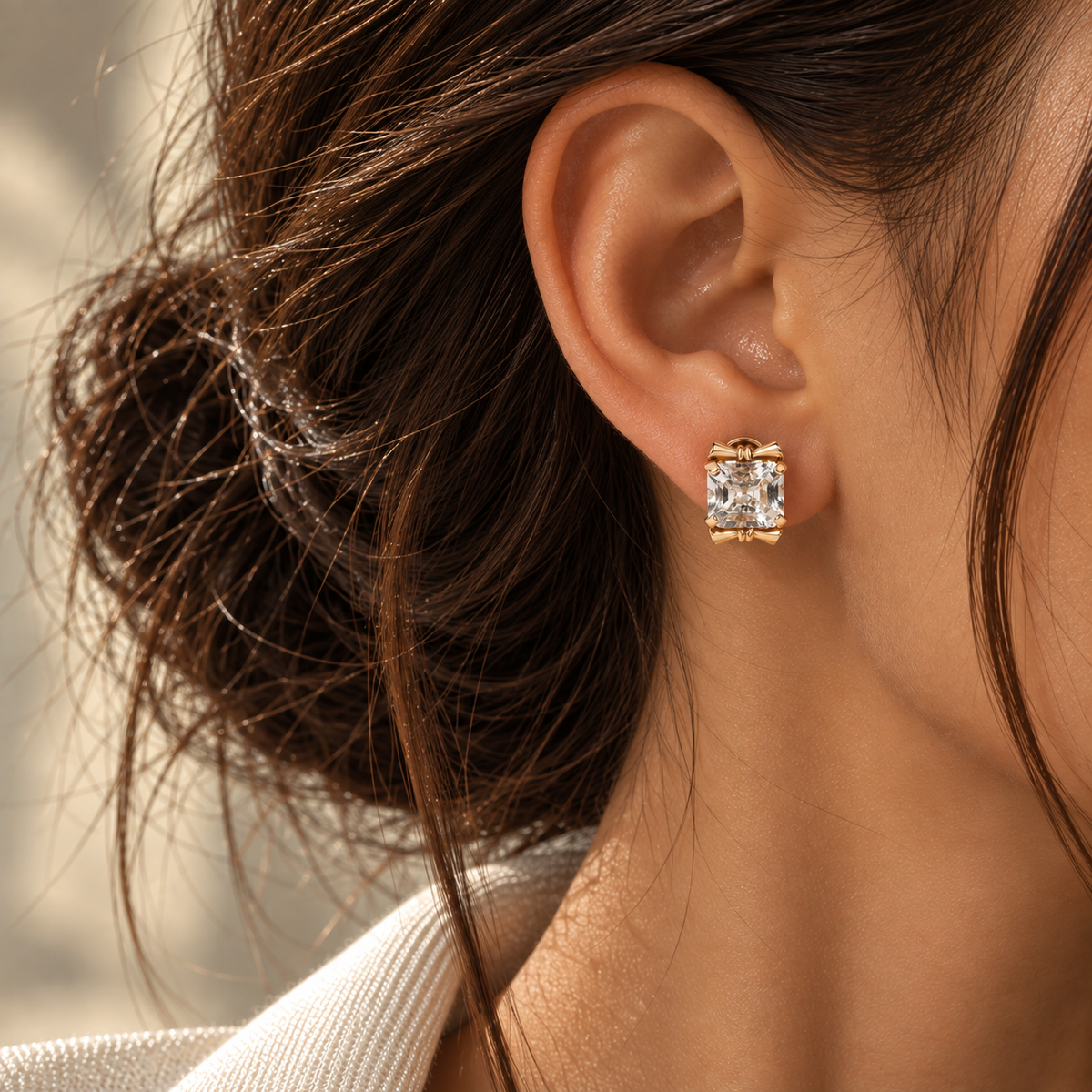Handmade Italian 14K yellow gold stud earrings featuring natural aquamarine beryl gemstones weighing 5.2 and 4.8 carats in an elegant square-cut design.