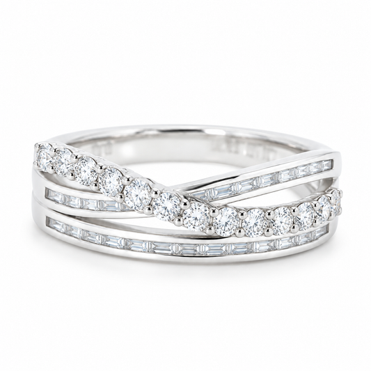 18K white gold crossover ring with two rows of channel-set baguette diamonds and a sweeping row of round natural diamonds.