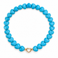 Natural blue Hubei turquoise heart bead necklace with an 18K gold vermeil heart-shaped clasp on a white background.