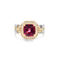 Red spinel and diamond halo Cuban link band ring crafted in 18K gold by Fantasilvia Fine Jewelry.

