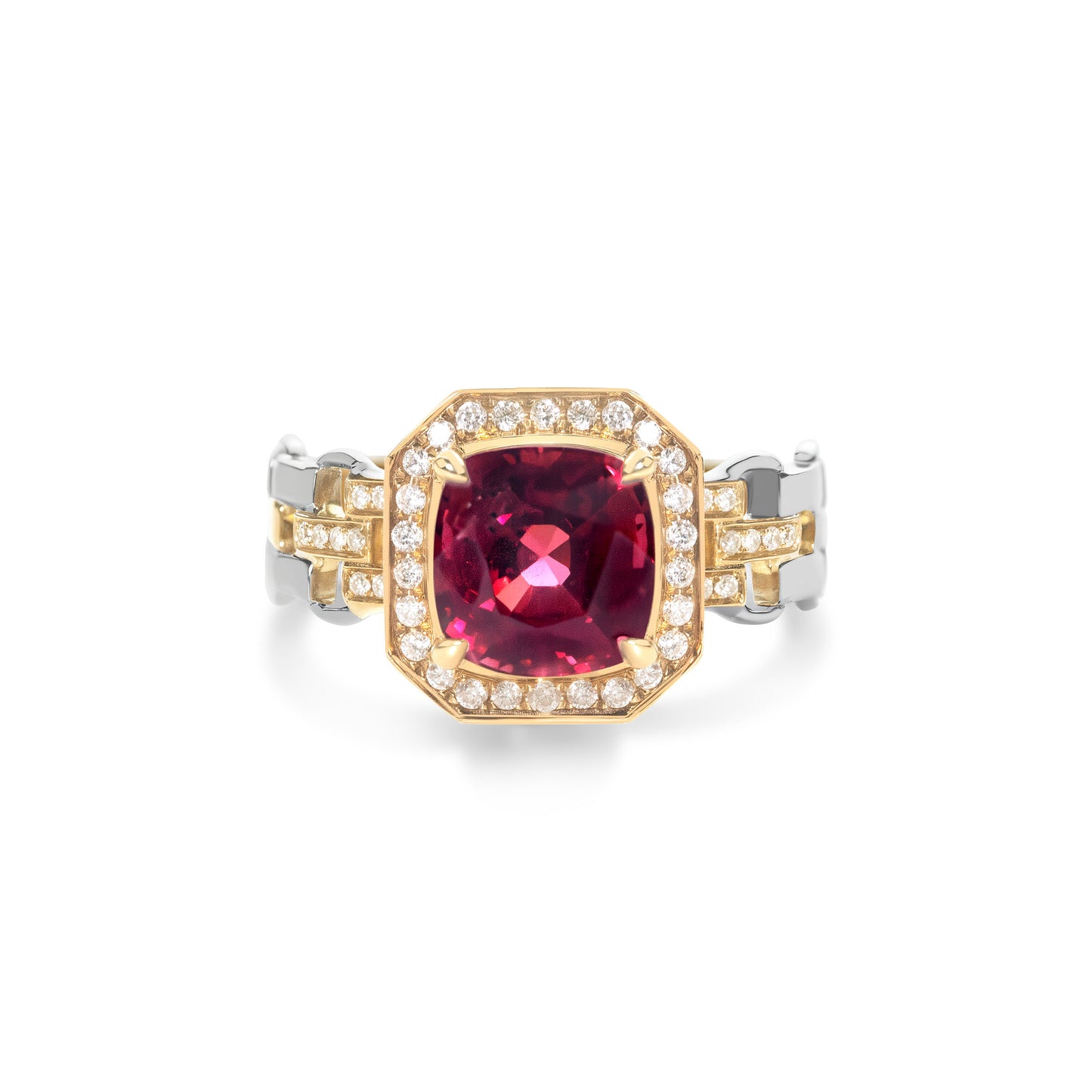 Red spinel and diamond halo Cuban link band ring crafted in 18K gold by Fantasilvia Fine Jewelry.

