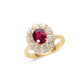 Natural ruby and diamond floral halo ring crafted in 18K gold by Fantasilvia Fine Jewelry.

