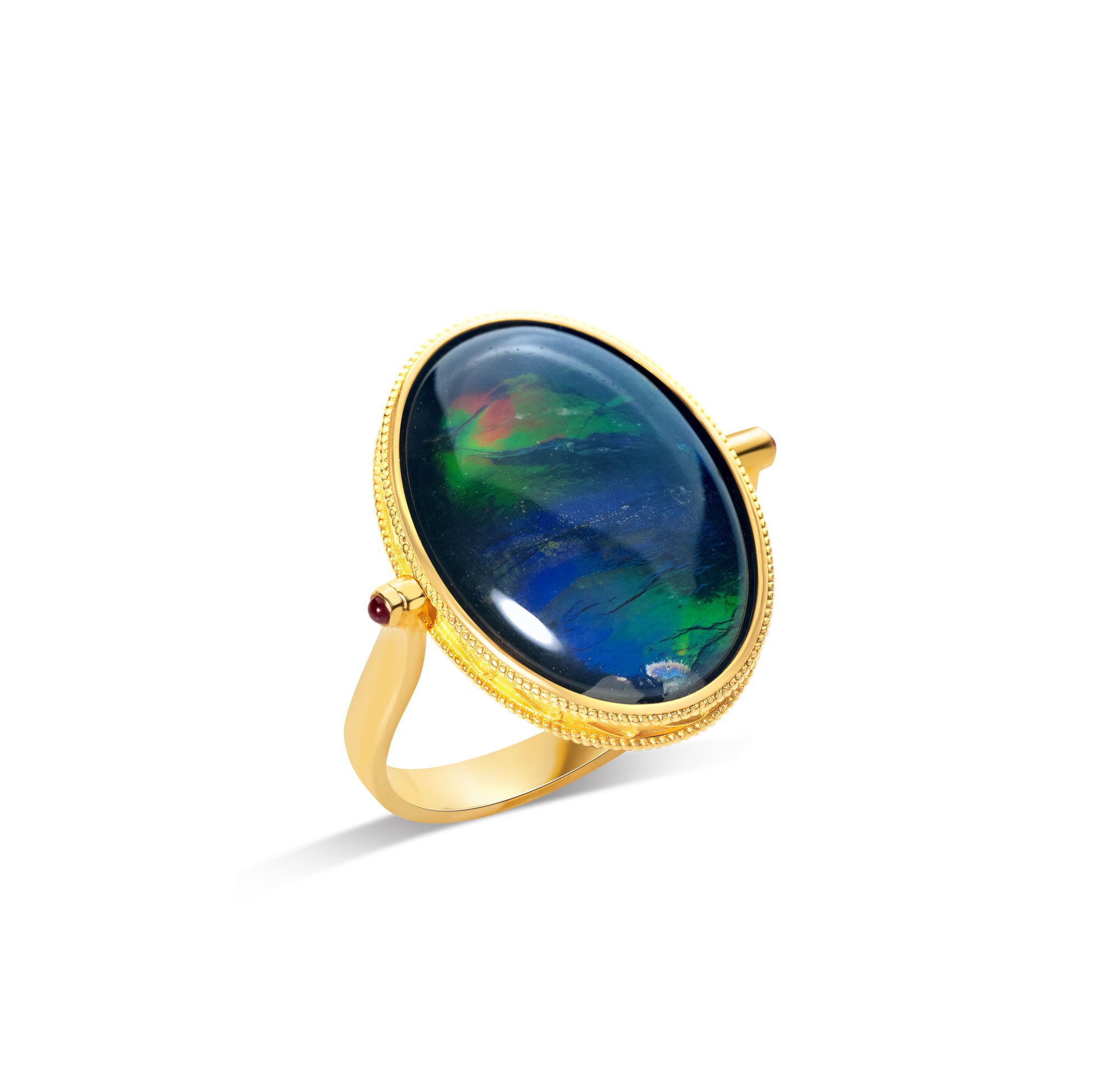 Oval ammolite ring in gold bezel setting with natural gemstone by Fantasilvia Fine Jewelry.
