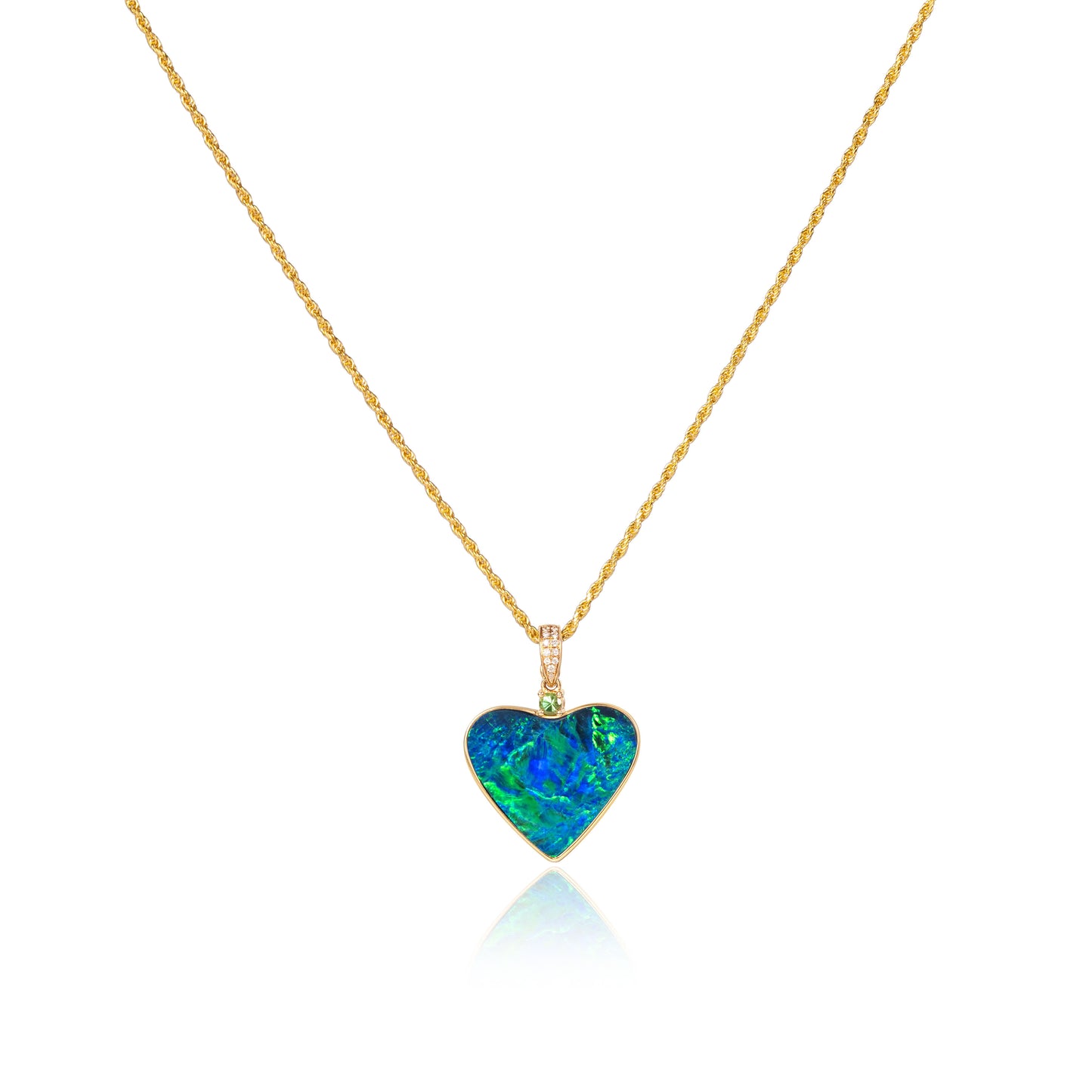 Natural opal heart pendant in fine gold by Fantasilvia Fine Jewelry.
