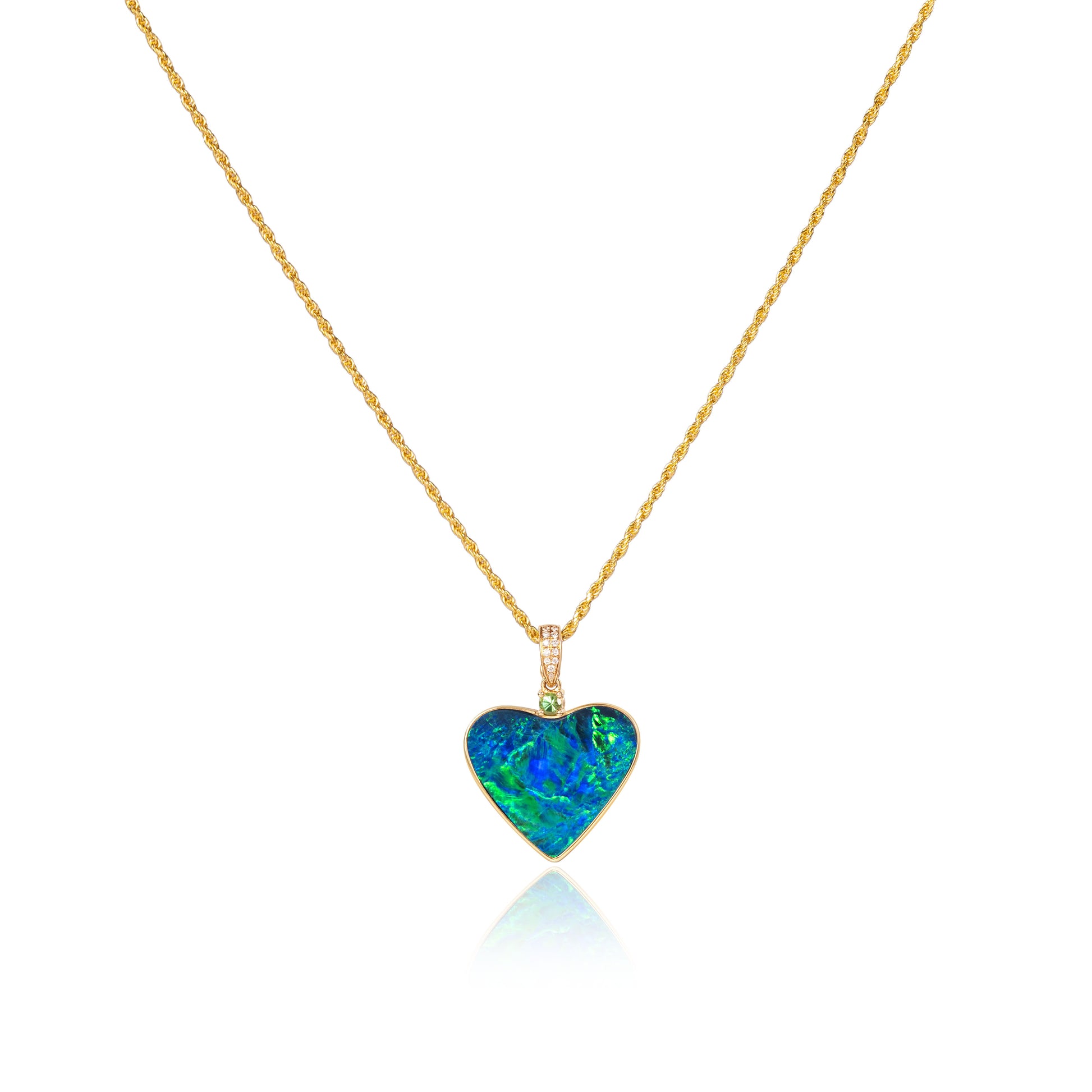 Natural opal heart pendant in fine gold by Fantasilvia Fine Jewelry.
