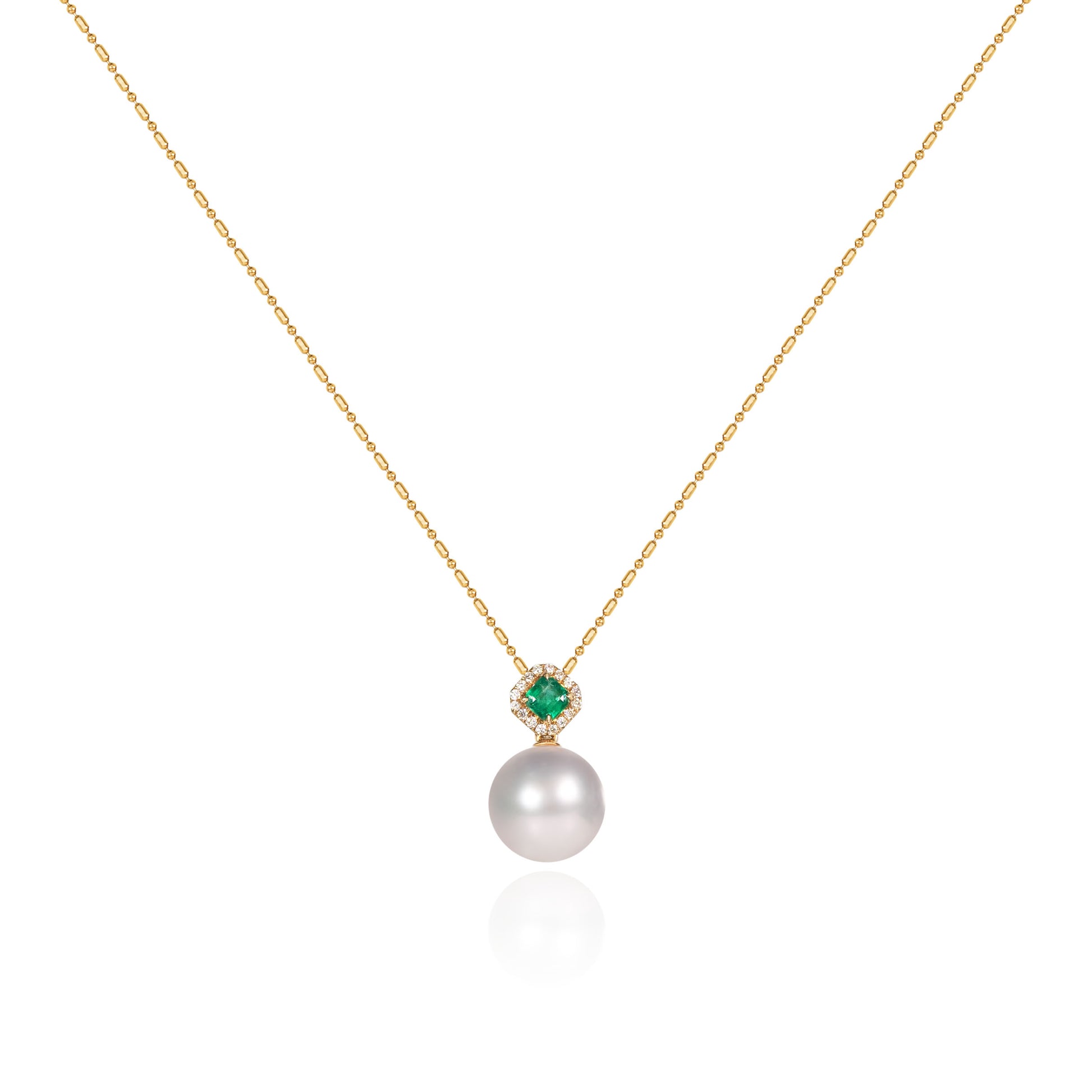 Pearl and emerald halo drop pendant with 12mm South Sea white pearl in 18K gold by Fantasilvia Fine Jewelry.
