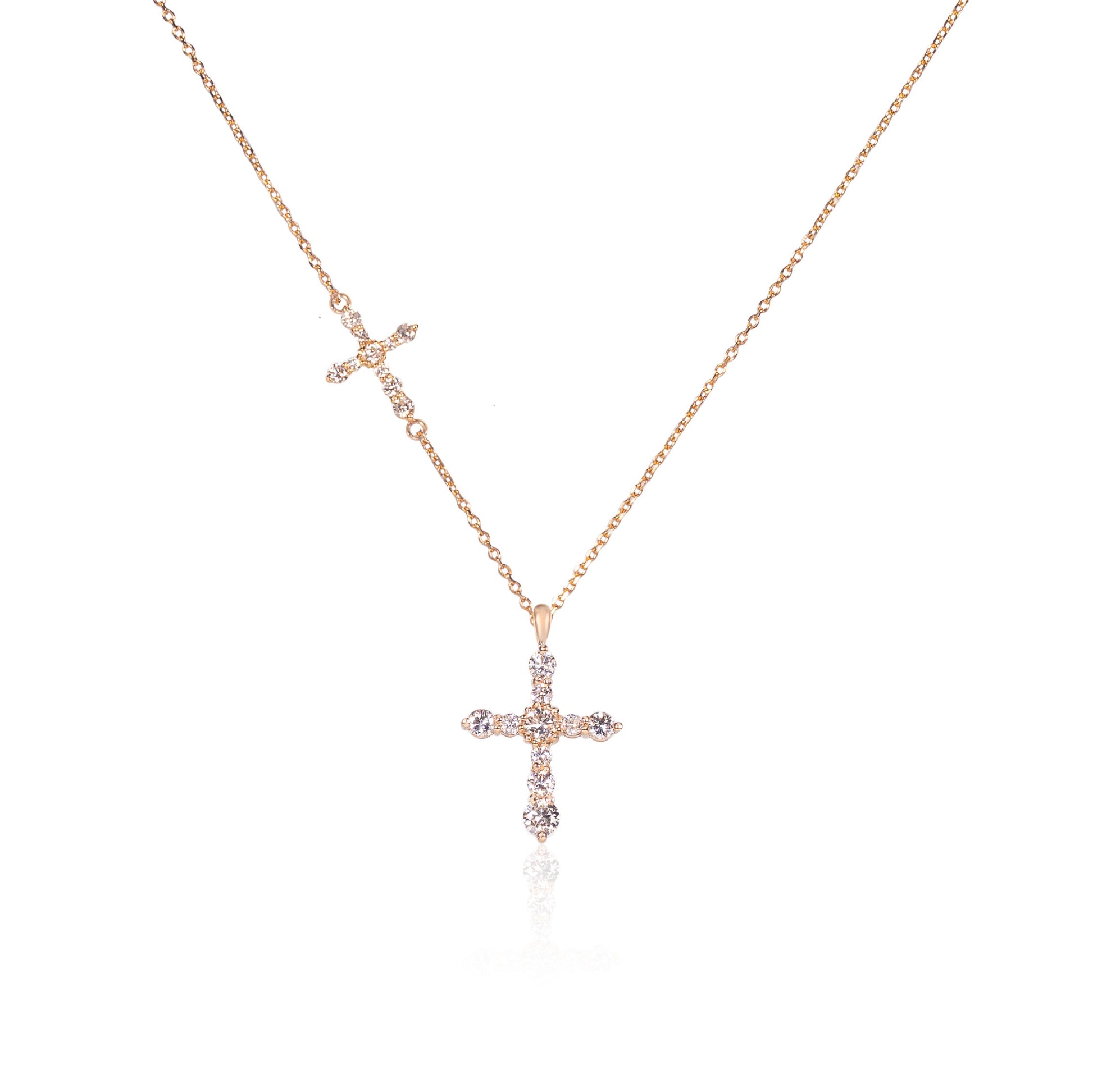 Double cross necklace with natural diamonds in fine gold by Fantasilvia Fine Jewelry.
