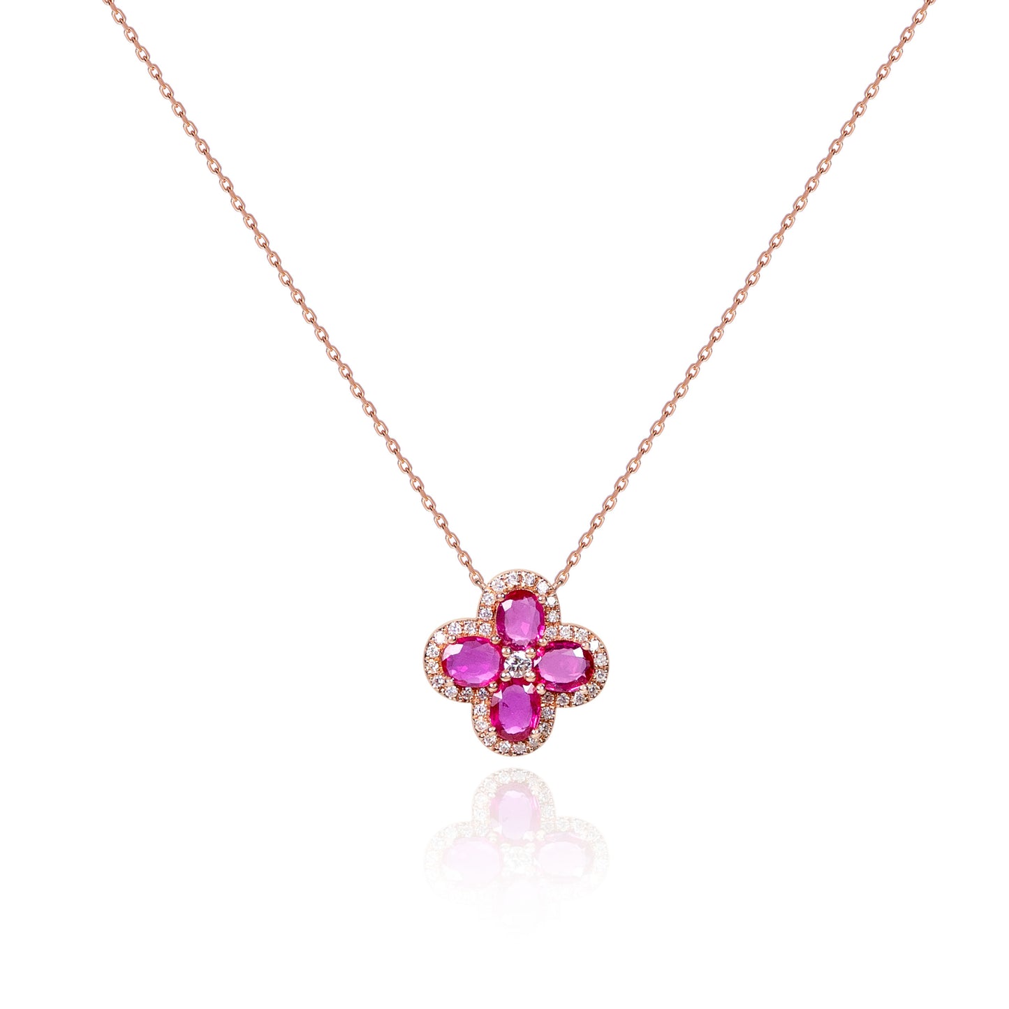 Natural ruby lucky clover necklace crafted in gold by Fantasilvia Fine Jewelry.
