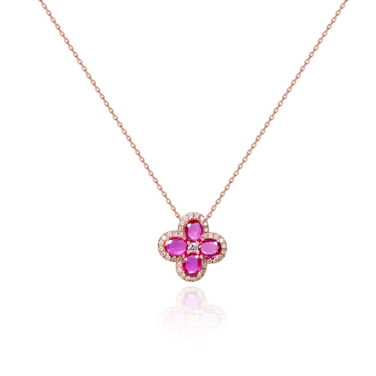 Natural ruby lucky clover necklace crafted in gold by Fantasilvia Fine Jewelry.
