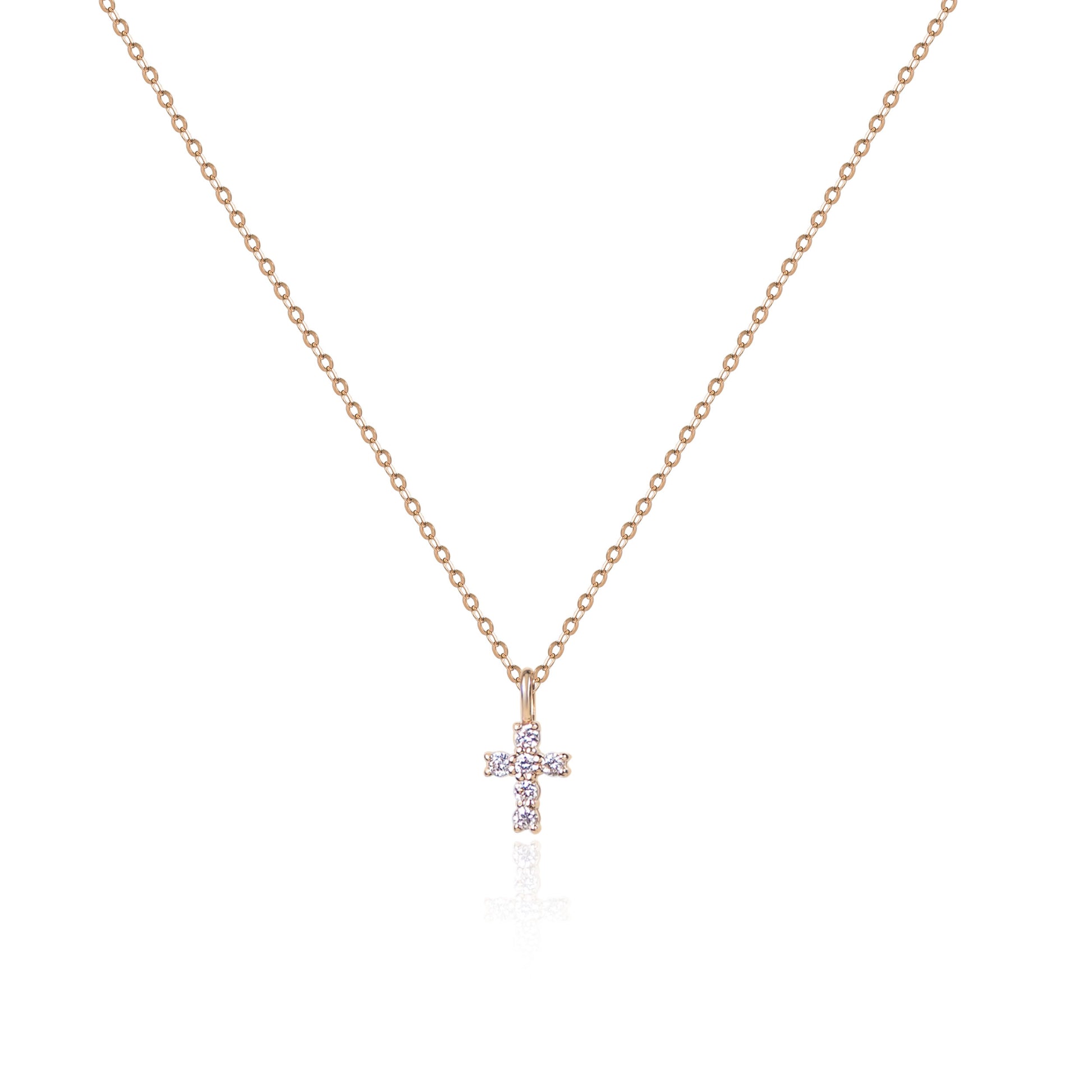 Mini cross natural diamond necklace in 18K gold by Fantasilvia Fine Jewelry.
