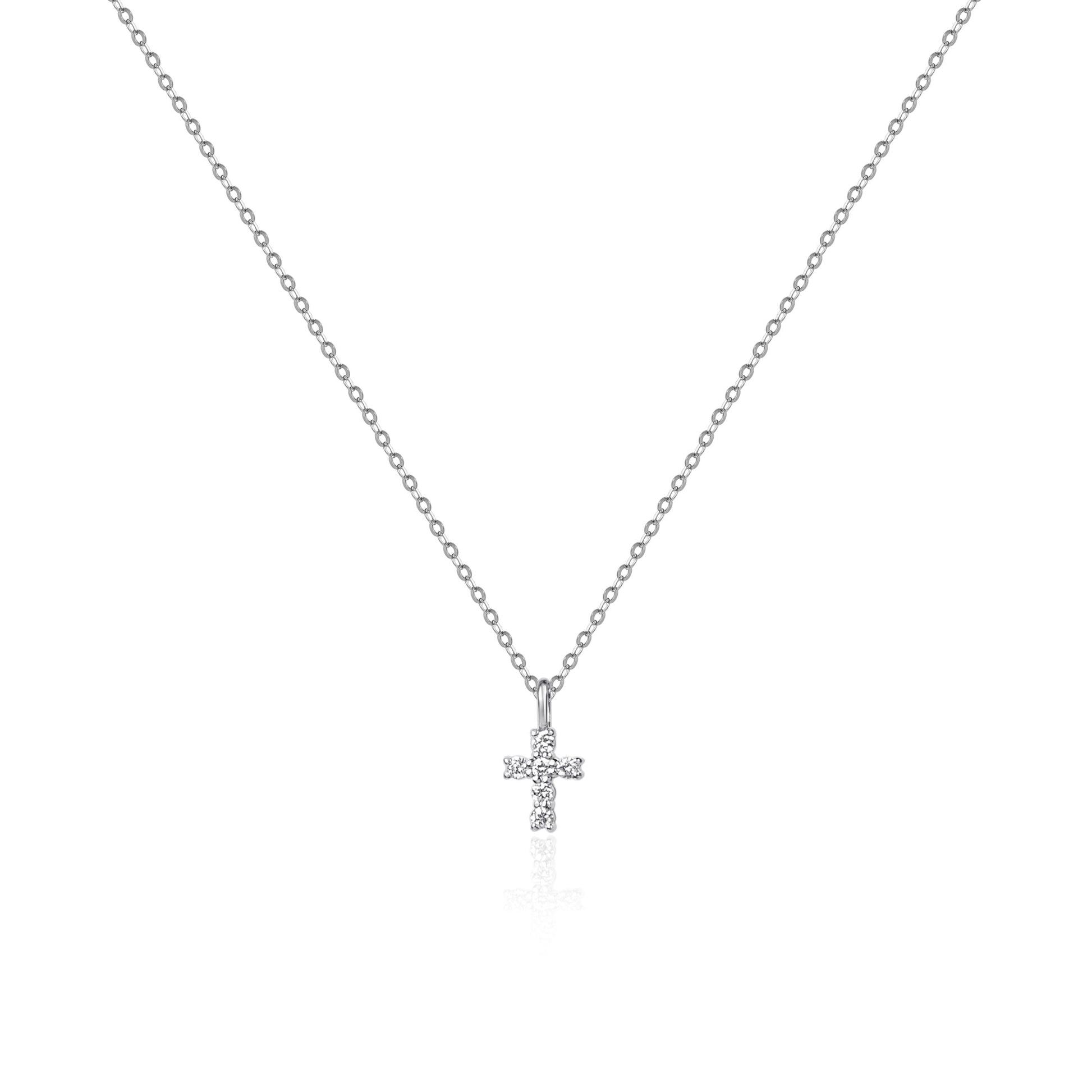 Mini cross natural diamond necklace in 18K gold by Fantasilvia Fine Jewelry.
