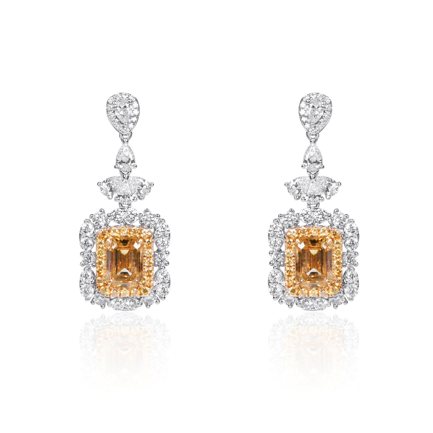 Natural yellow and colorless diamond drop earrings in fine gold by Fantasilvia Fine Jewelry.
